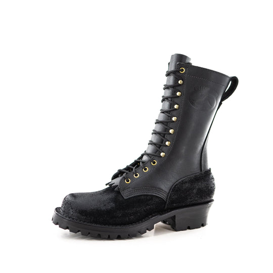 Profile view of the Fire Inlander - Black showing the contrast between the black rough leather and smooth black vamp.