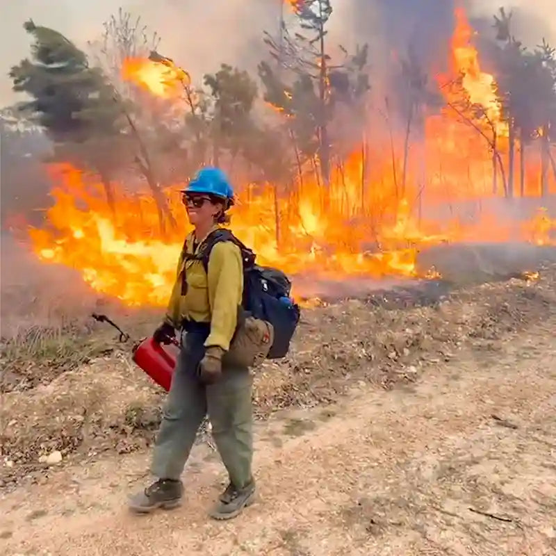 wildland fire fighter working the line in jk boots