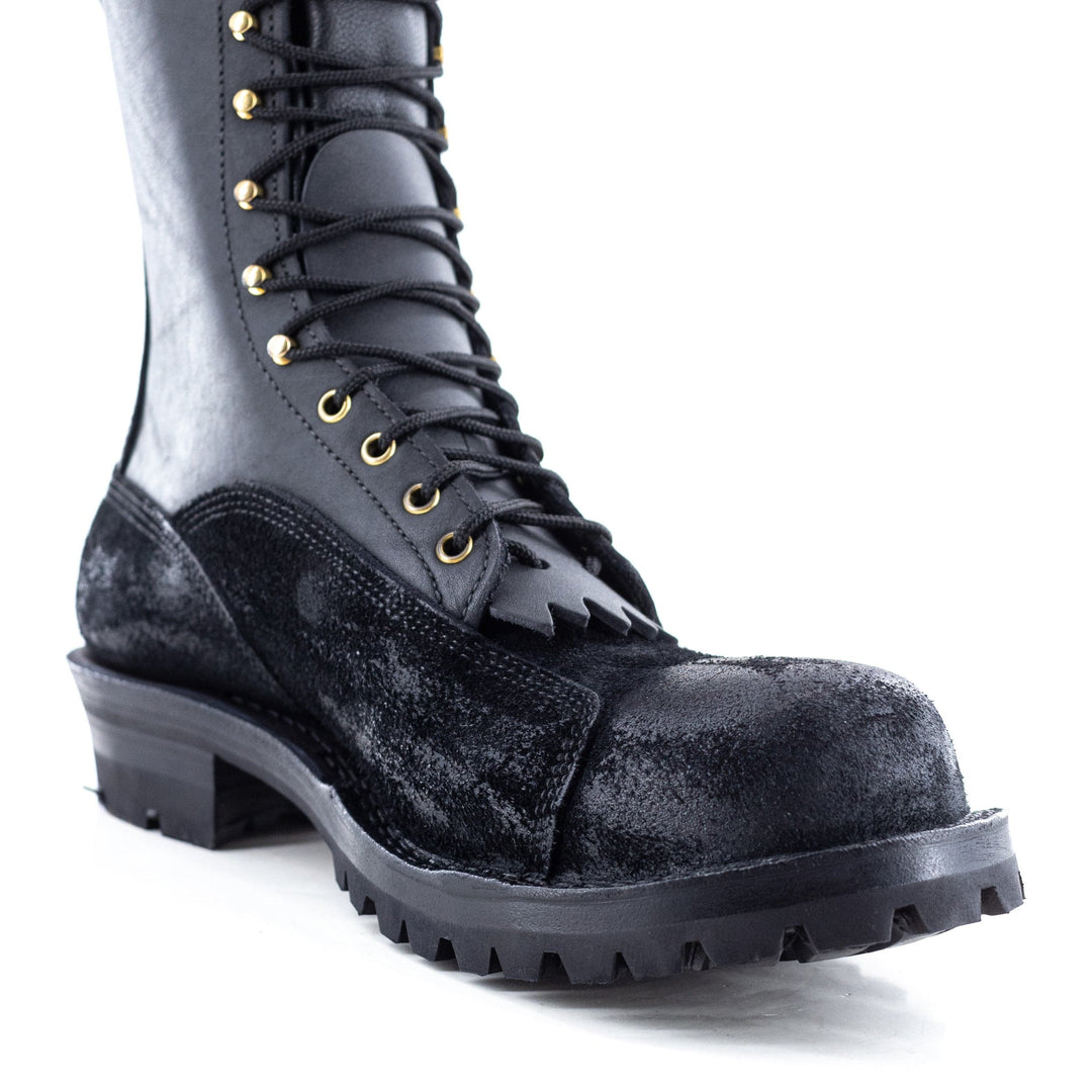 Front view of the climber boot on a white background showing the shape of the boot.