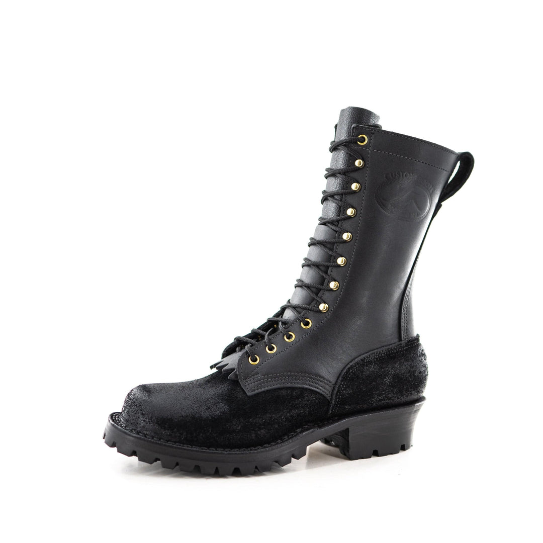 Profile view of the Fire Inlander - Black showing the contrast between the black rough leather and smooth black vamp.