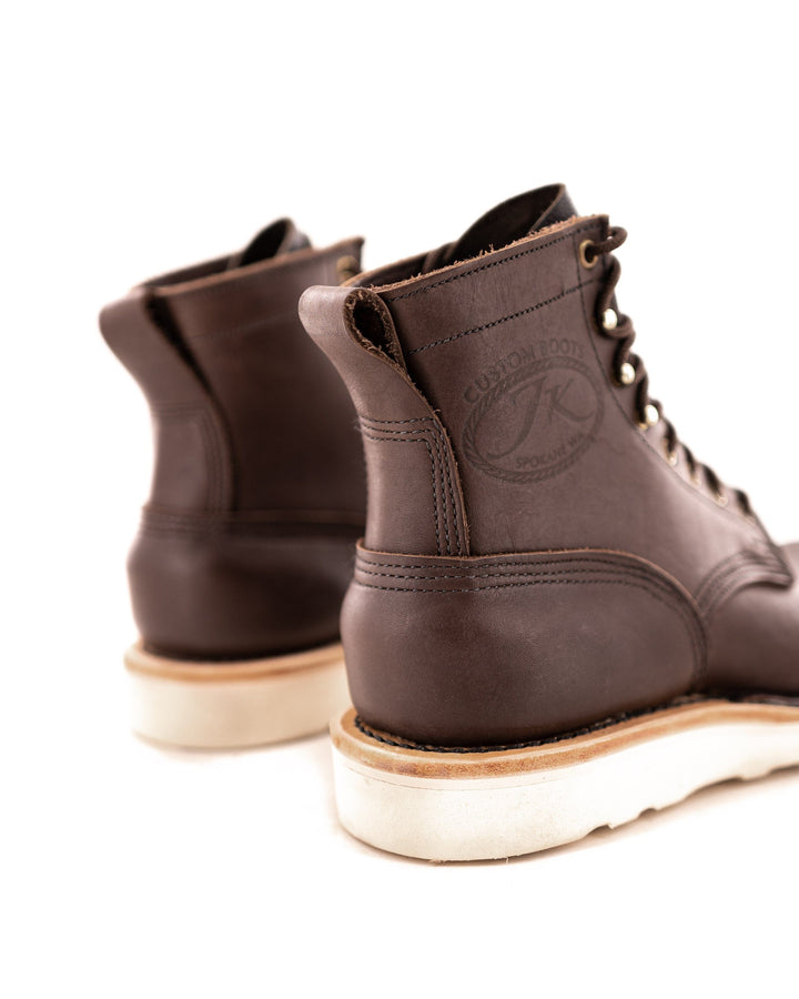 rear view of the Forefront - Brown showing the pull tabs and the heel covers.