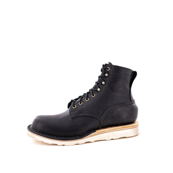 side profile view of the Forefront (Safety Toe) - Black showing the contrast between the white sole and the black boot.