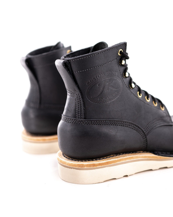 rear view of the Forefront (Safety Toe) - Black showing off the sleek pull tab on heel.