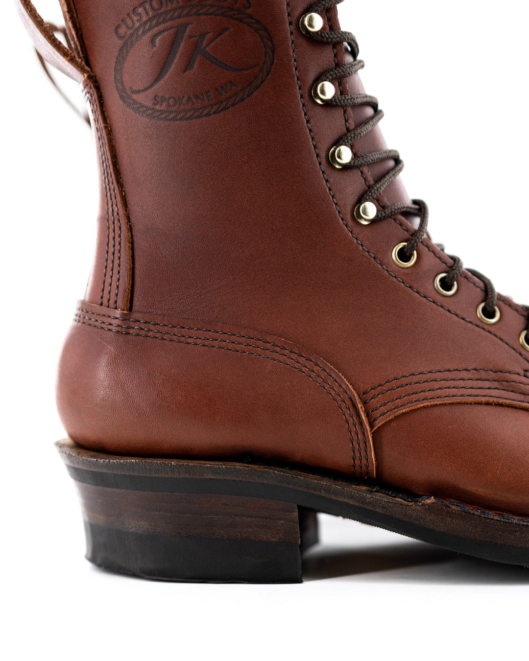 close up of the JK stamp showing the texture of the leather.