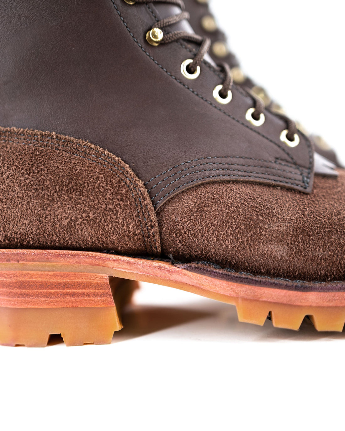 close up of the Stitching of the Honey Fire - Brown.